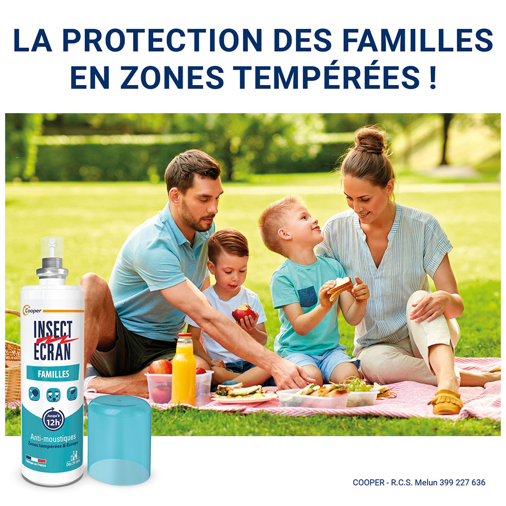 Famille pique-niquant. Spray INSECT ÉCRAN et bouchon bleu à côté.